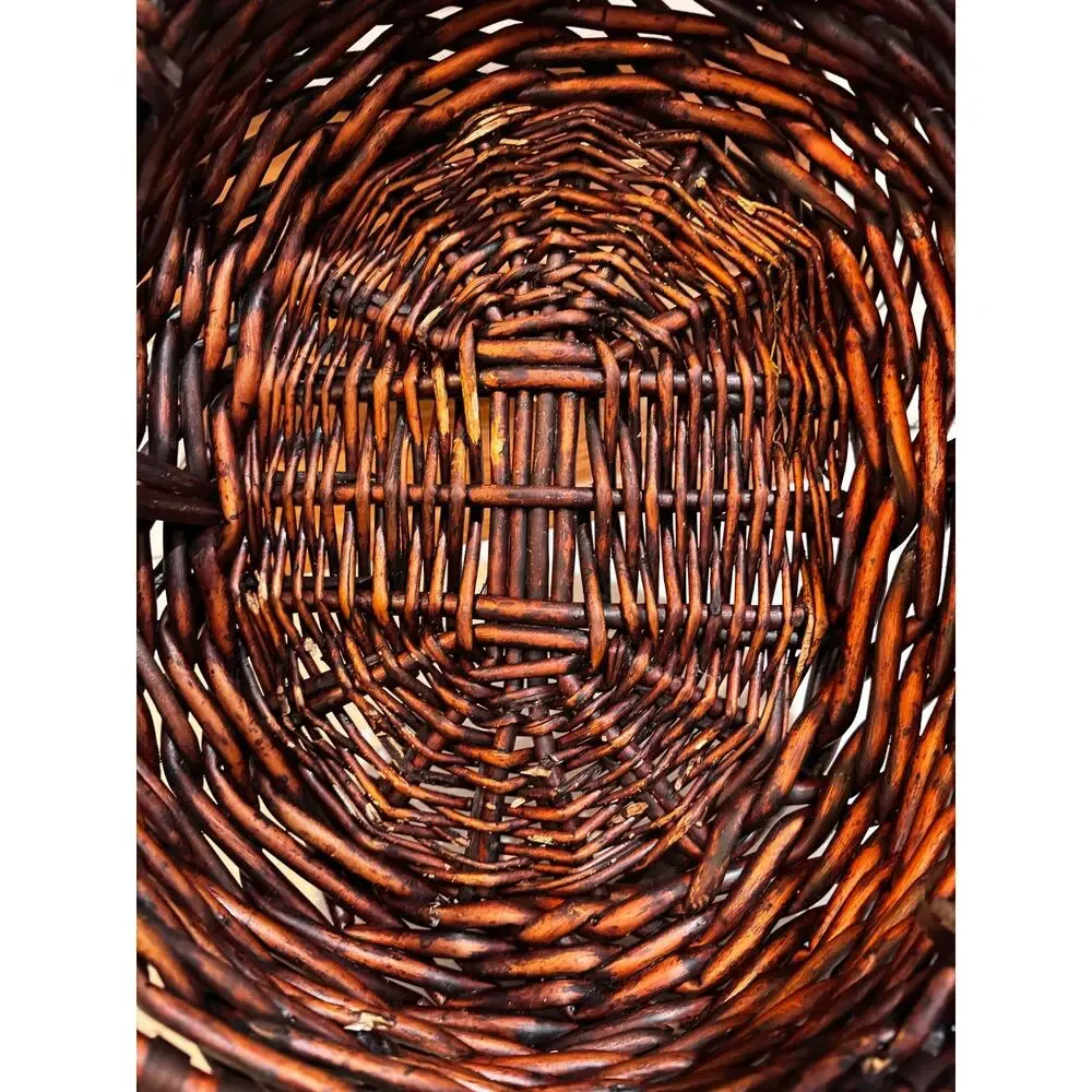 dark stained willow basket rustic handwoven texture sturdy center handle vintage